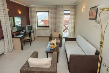 Фото номера Апартаменты с 1 спальней Отель Rhodopi Home Hotel - Half Board г. Чепеларе 8