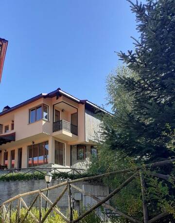 Фото номера Вилла с 3 спальнями Гостевой дом Rodopi Houses г. Чепеларе 14