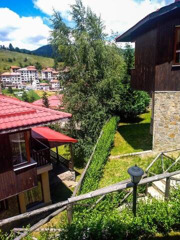 Фото номера Вилла с 2 спальнями Гостевой дом Rodopi Houses г. Чепеларе 17